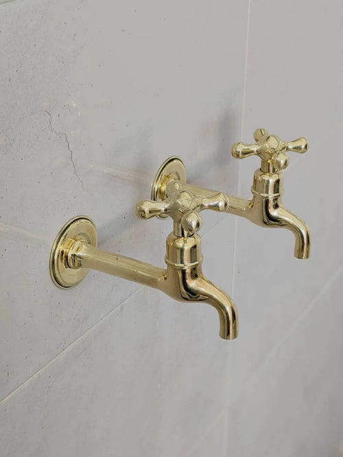 Wall mount faucets