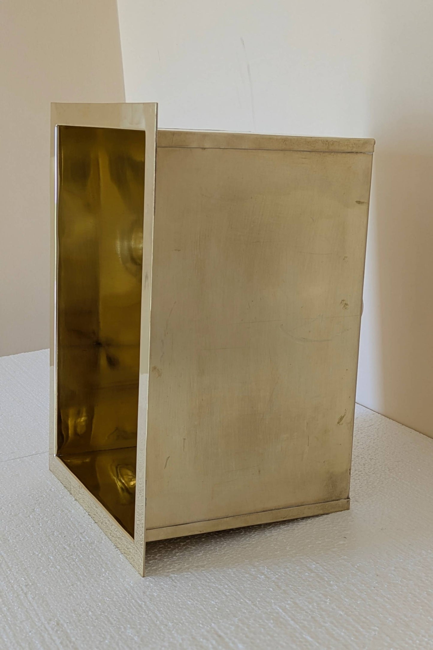 Undermount Single Bowl brass Sink: Rectangular Unlacquered Sink With It Drain Basket.