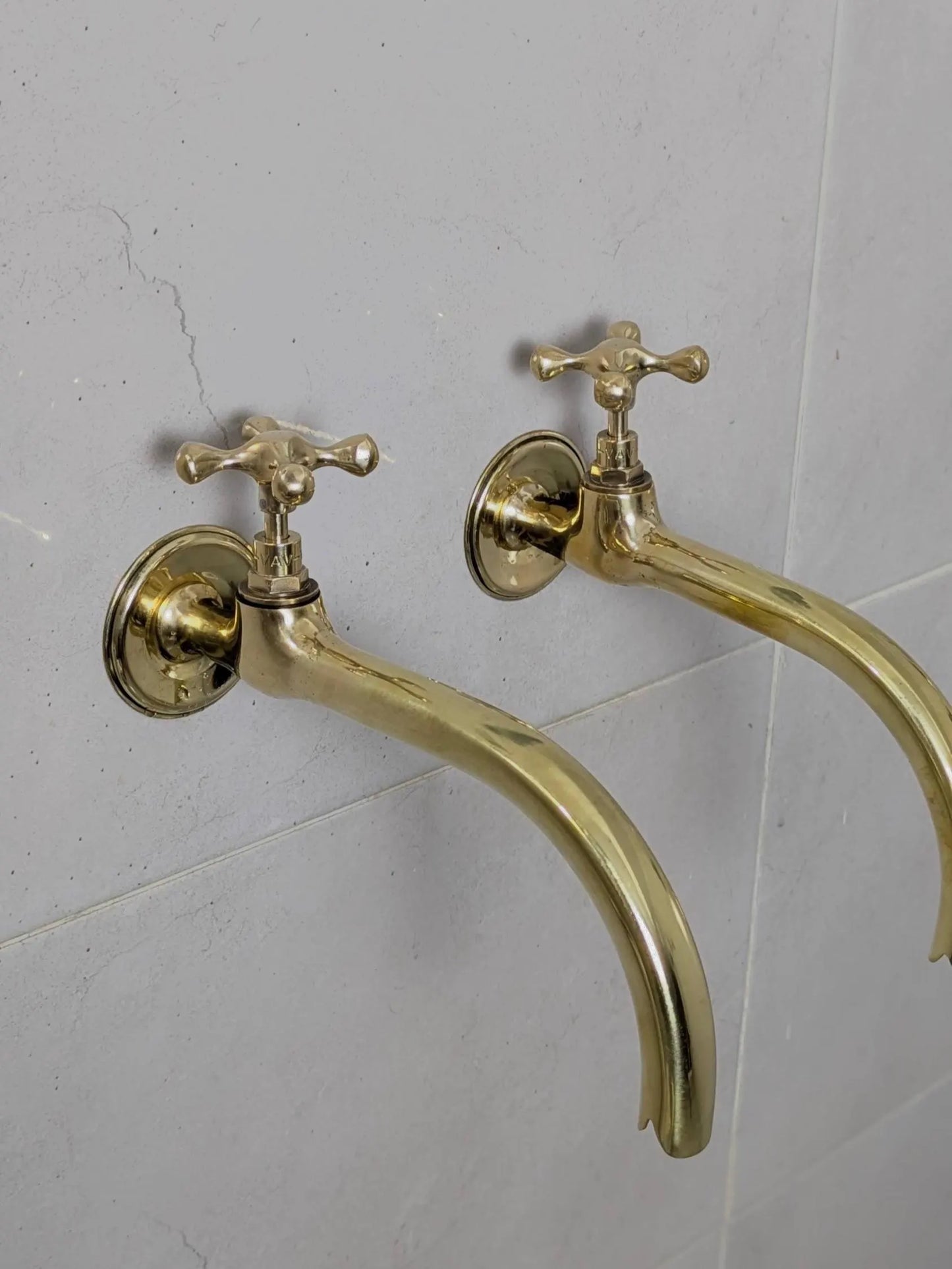 antique brass wall faucets