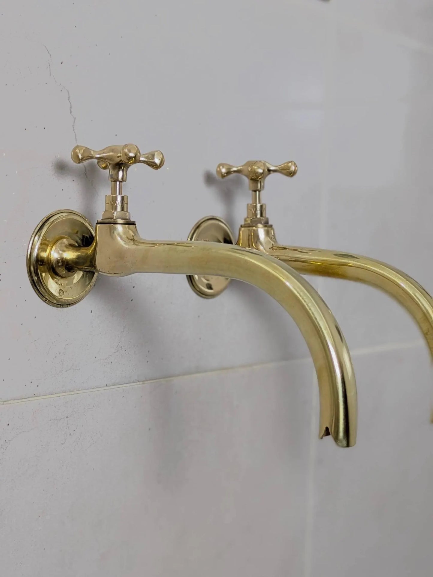 antique brass wall faucets