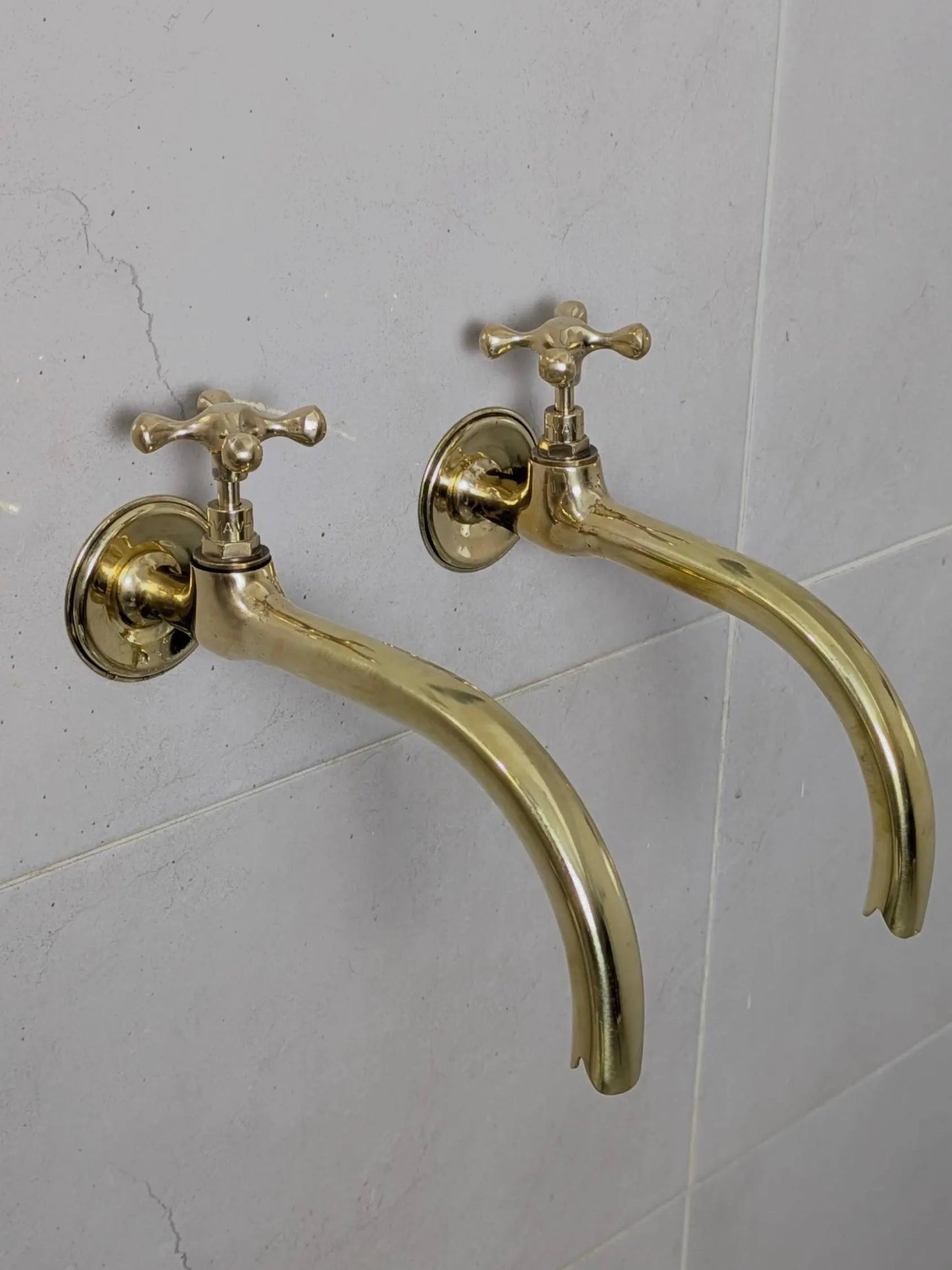 antique brass wall faucets