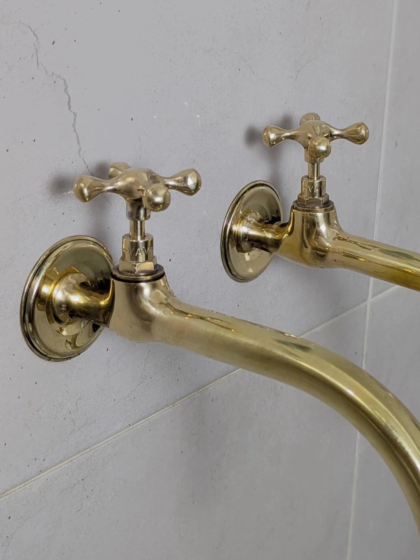 antique brass wall faucets