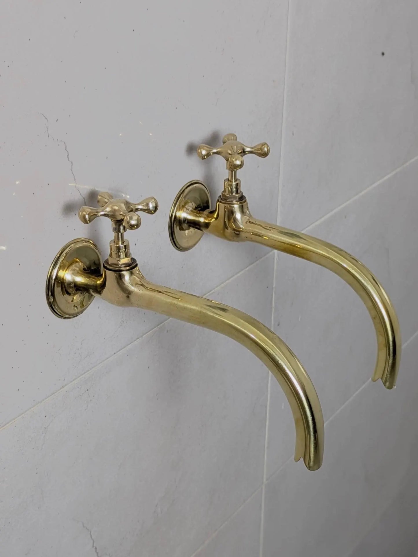 antique brass wall faucets