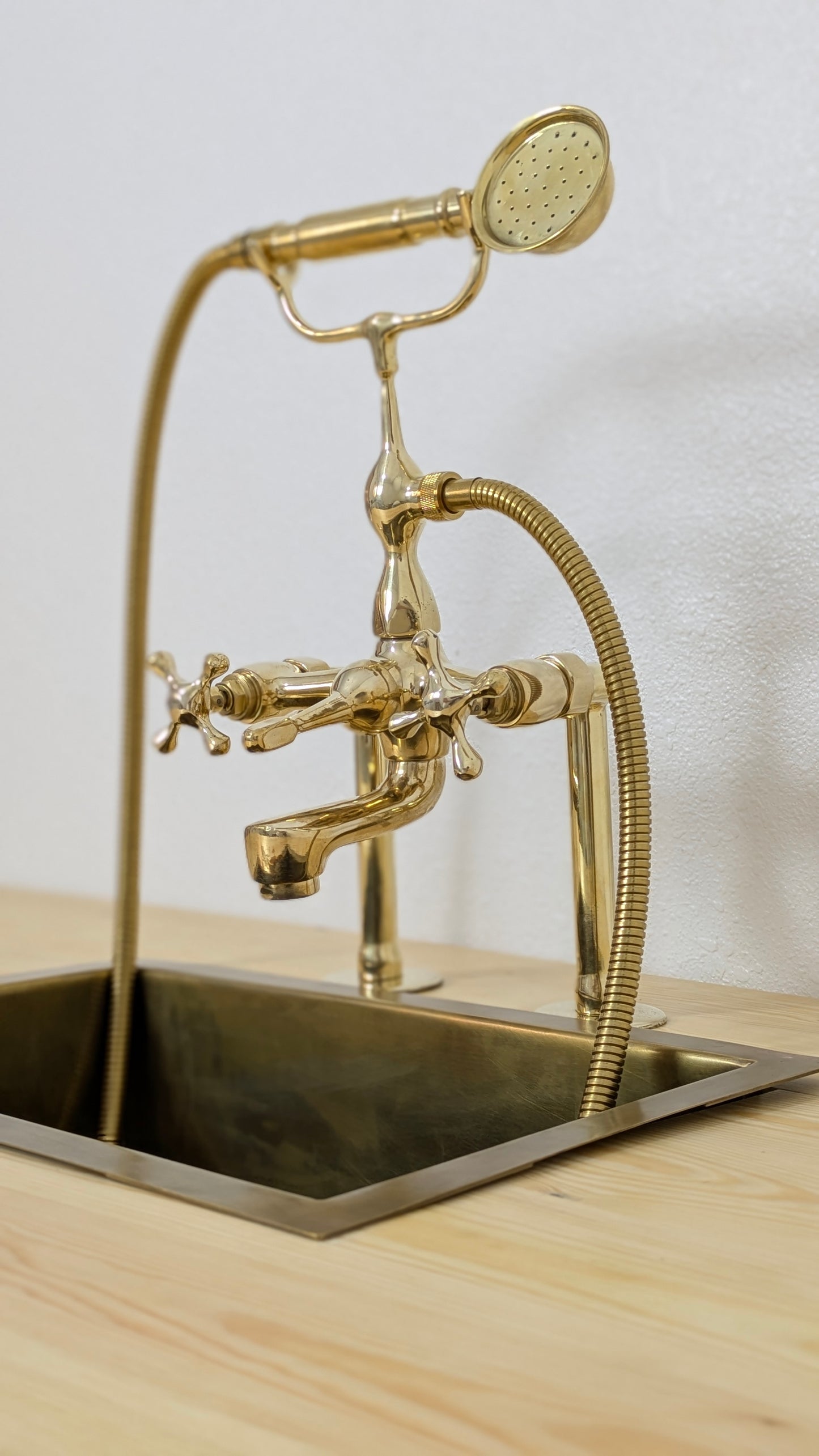 Unlacquered Brass Deck Mounted Bath Filler with Hand Shower