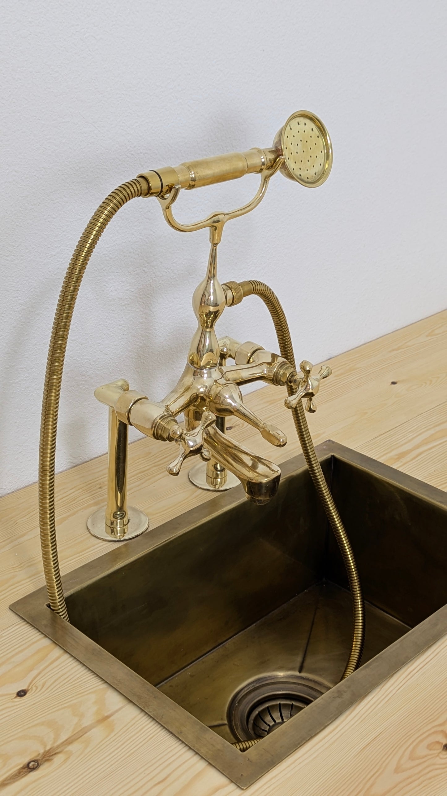 Unlacquered Brass Deck Mounted Bath Filler with Hand Shower