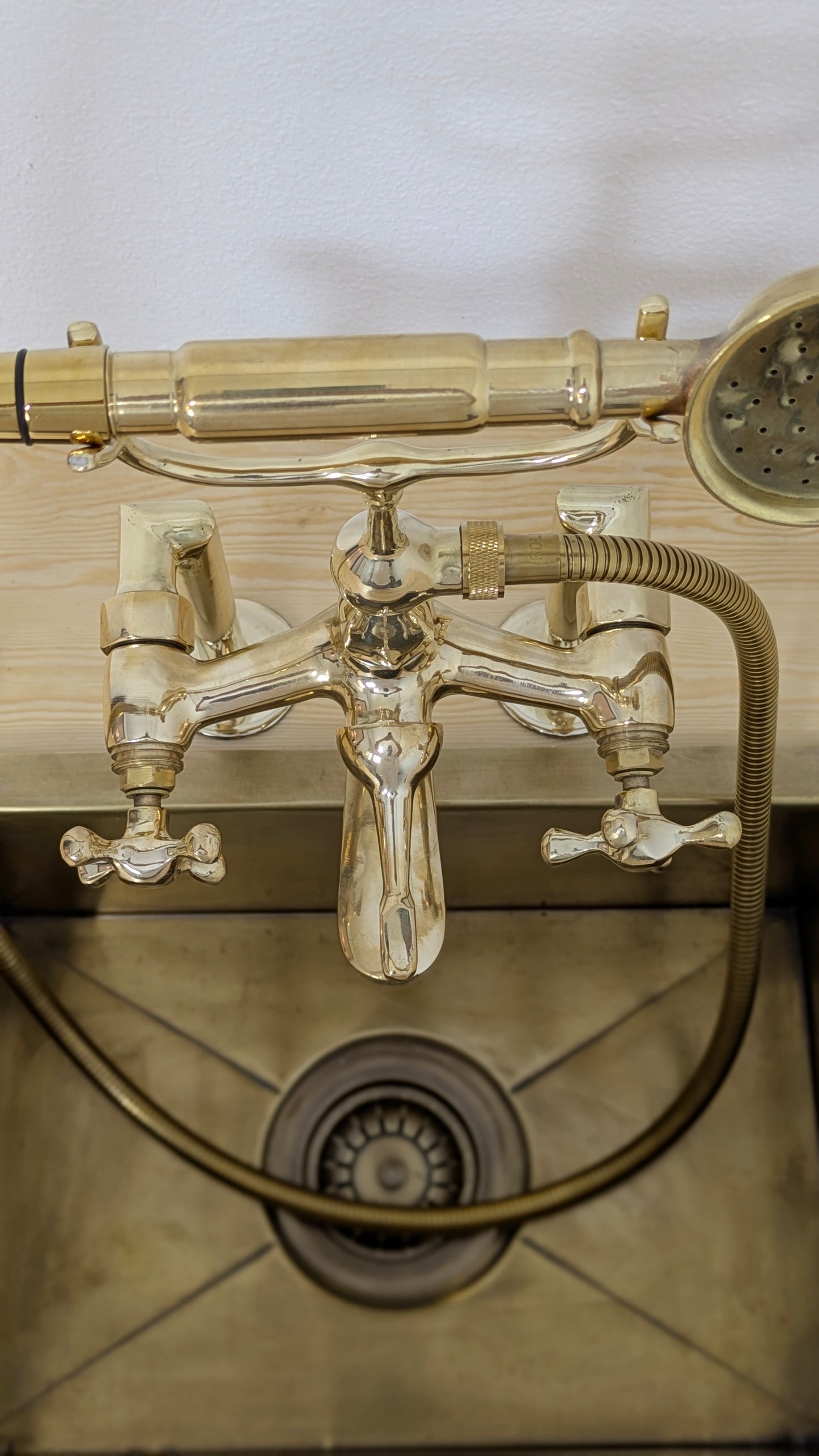 Unlacquered Brass Deck Mounted Bath Filler with Hand Shower