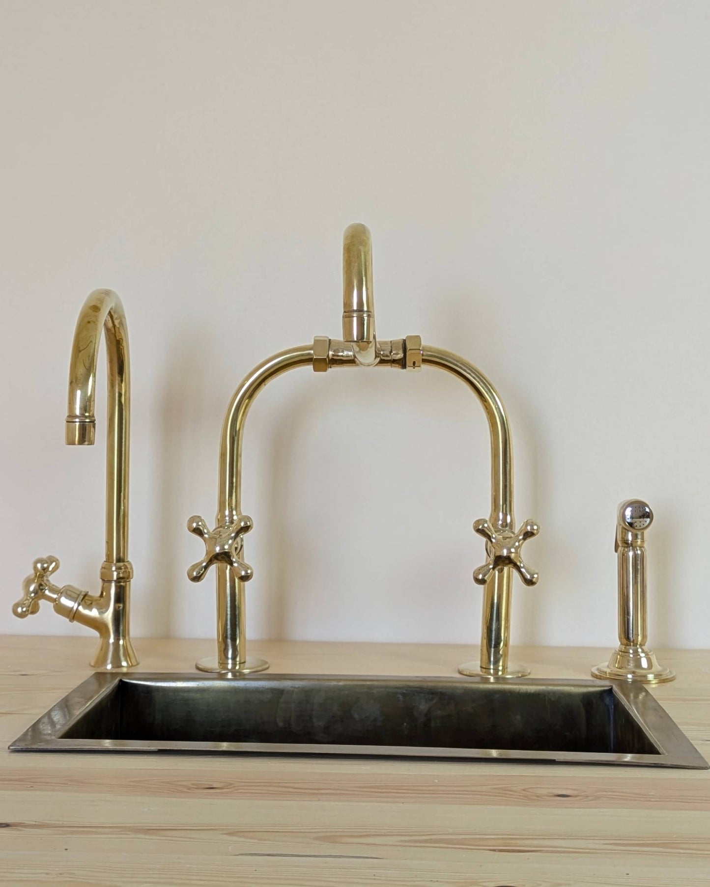 Unlacquered Brass Bridge Kitchen Set With A Side Sprayer And Cold Water Faucet.