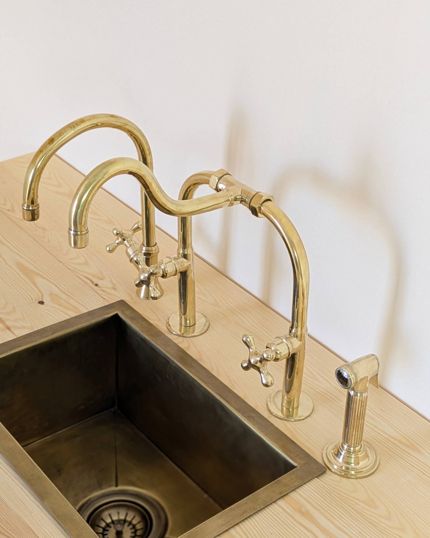 Unlacquered Brass Bridge Kitchen Set With A Side Sprayer And Cold Water Faucet.