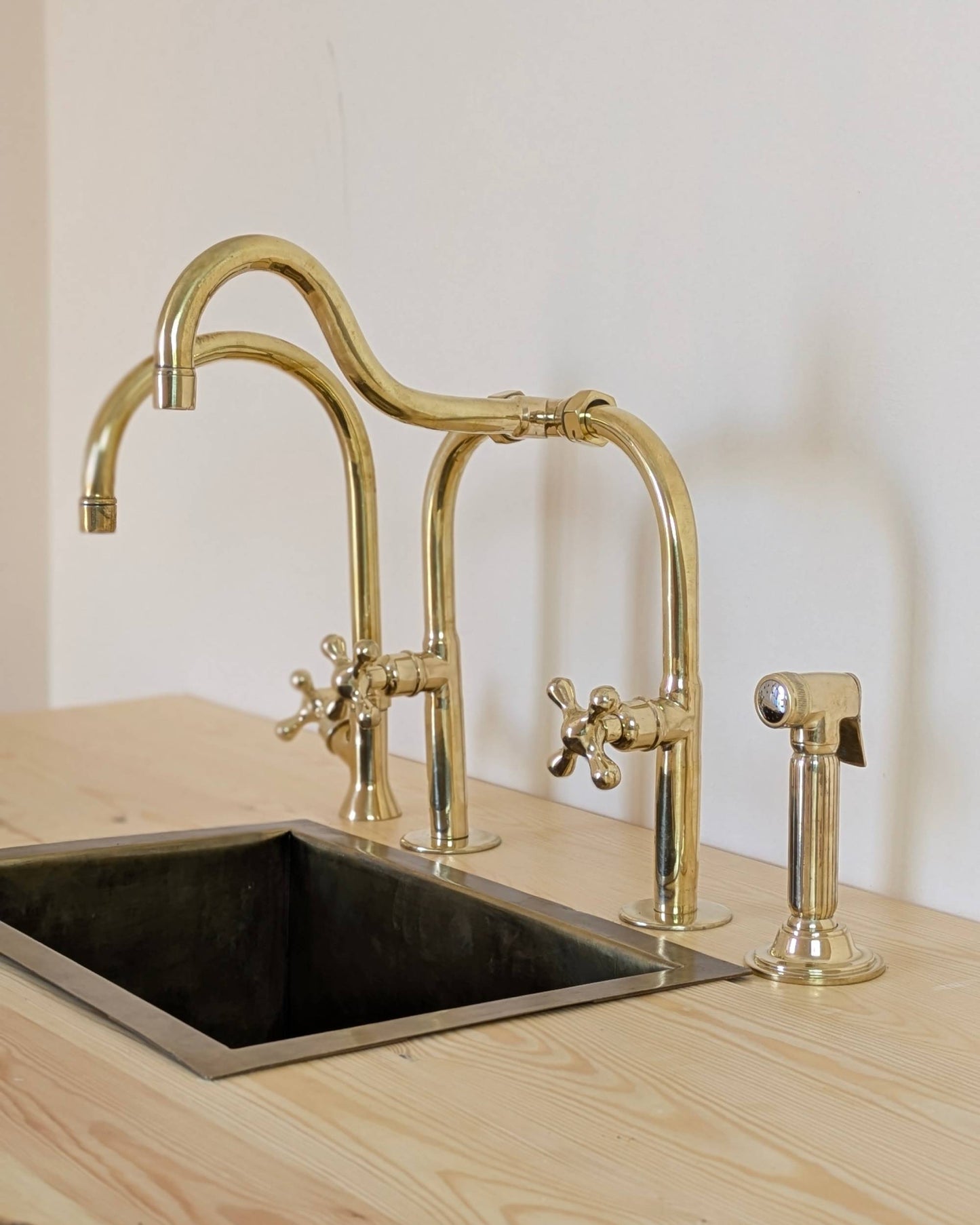 Unlacquered Brass Bridge Kitchen Set With A Side Sprayer And Cold Water Faucet.