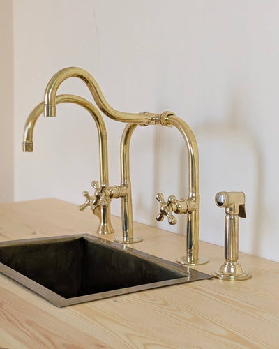 Unlacquered Brass Bridge Kitchen Set With A Side Sprayer And Cold Water Faucet.