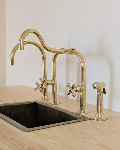 Unlacquered Brass Bridge Kitchen Set With A Side Sprayer And Cold Water Faucet.