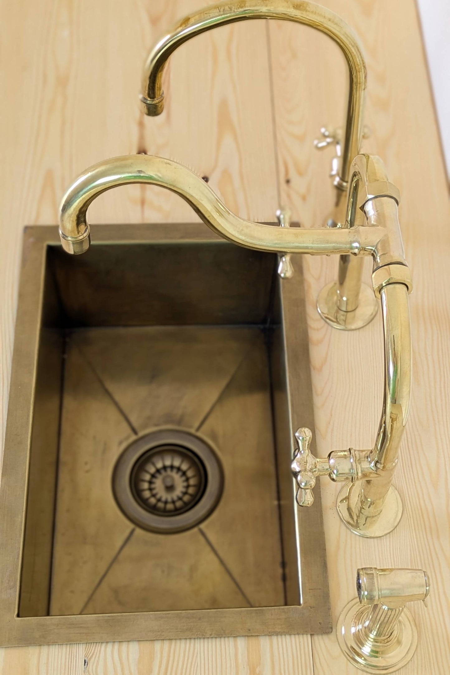 Unlacquered Brass Bridge Kitchen Set With A Side Sprayer And Cold Water Faucet.