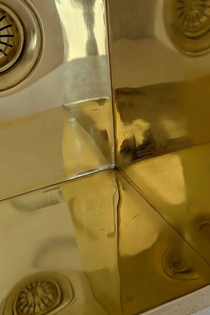 Undermount Single Bowl brass Sink: Rectangular Unlacquered Sink With It Drain Basket.