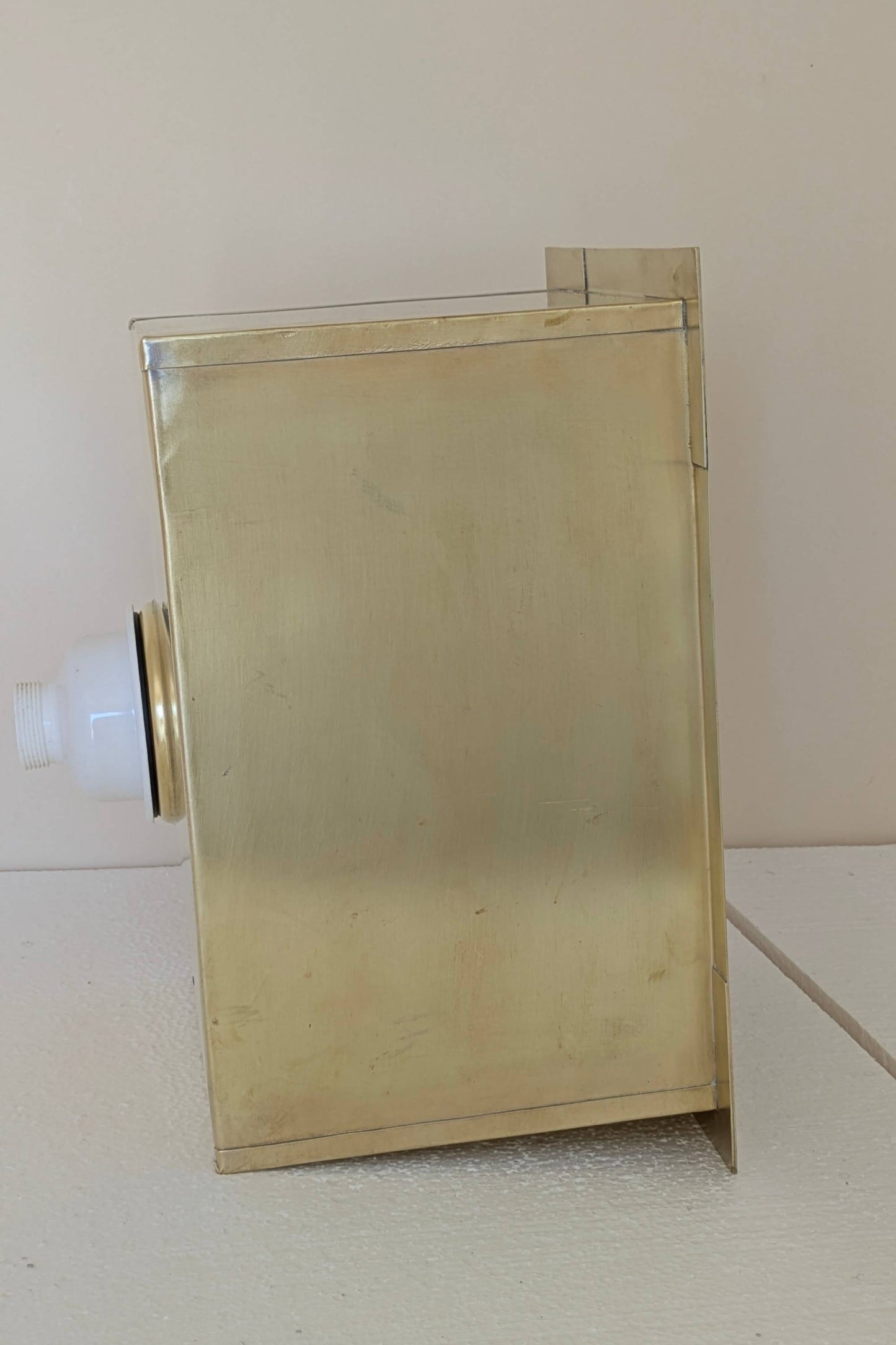 Undermount Single Bowl brass Sink: Rectangular Unlacquered Sink With It Drain Basket.