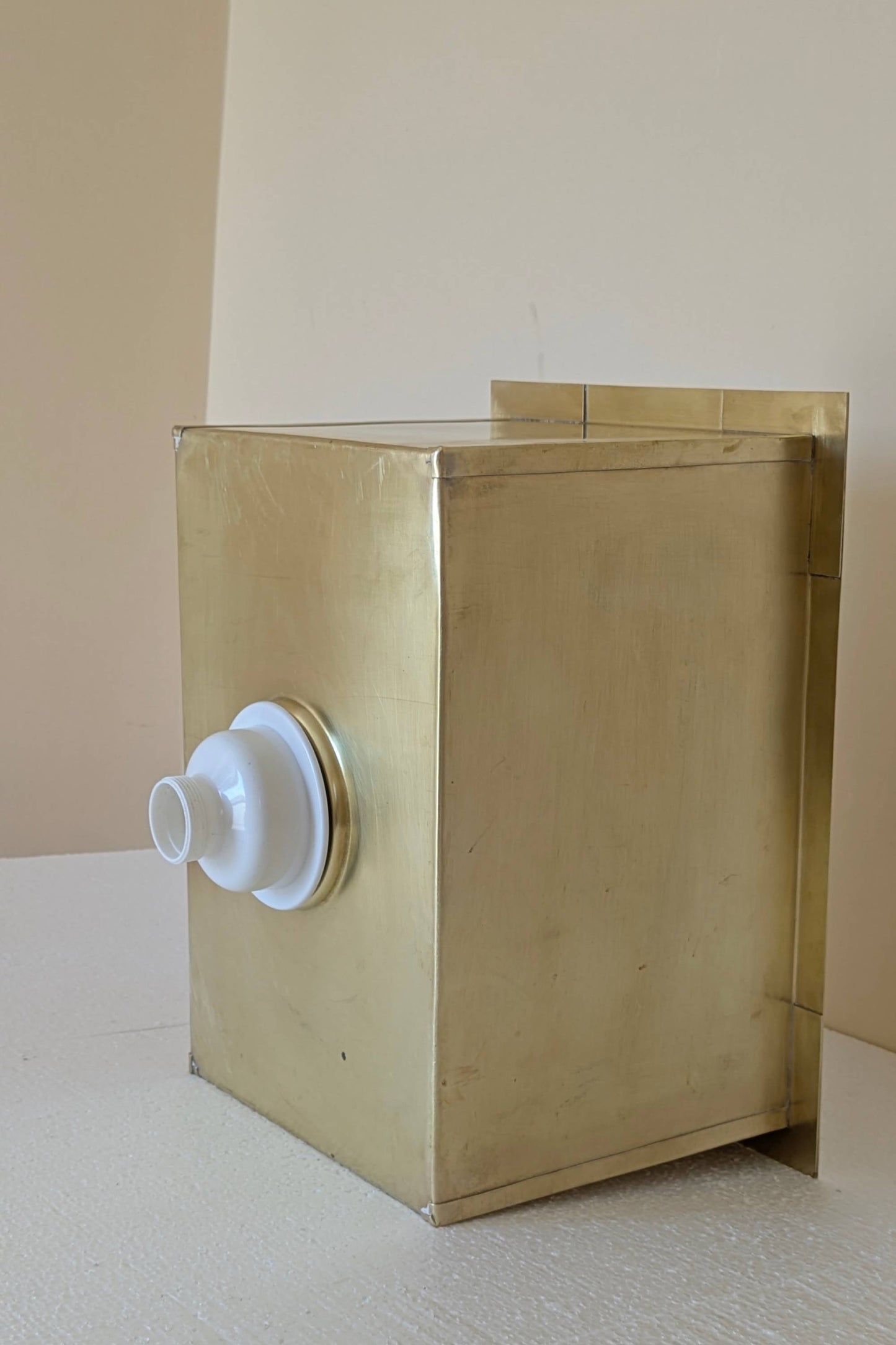 Undermount Single Bowl brass Sink: Rectangular Unlacquered Sink With It Drain Basket.