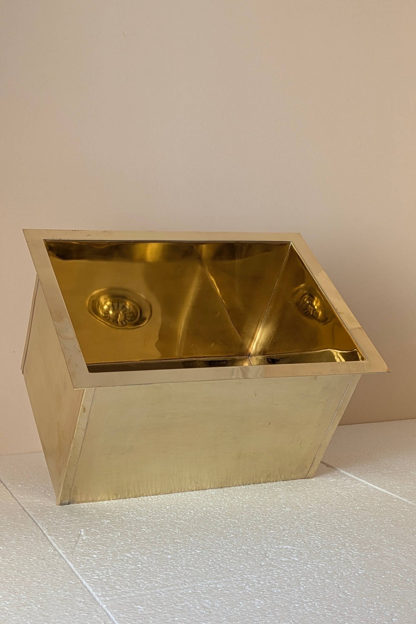 Undermount Single Bowl brass Sink: Rectangular Unlacquered Sink With It Drain Basket.