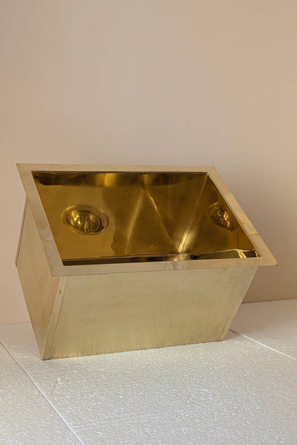Undermount Single Bowl brass Sink: Rectangular Unlacquered Sink With It Drain Basket.