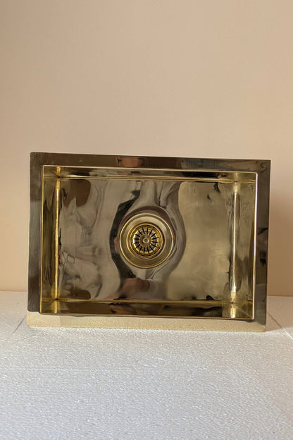 Undermount Single Bowl brass Sink: Rectangular Unlacquered Sink With It Drain Basket.