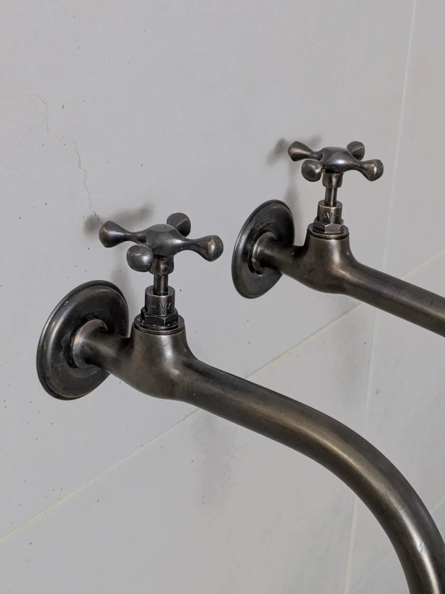Vintage Brass and Blackened Wall-Mount Faucets