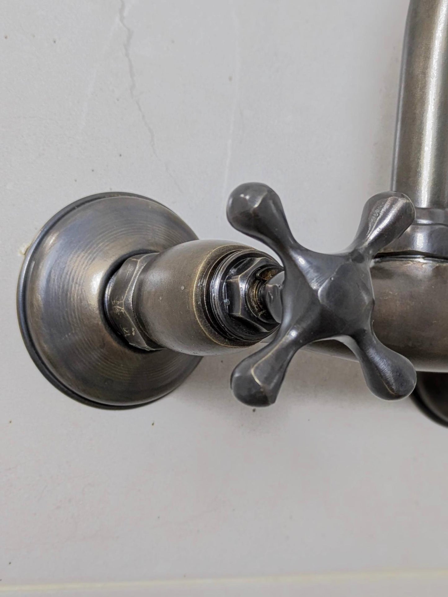 Vintage Brass and Blackened Wall-Mount Faucets