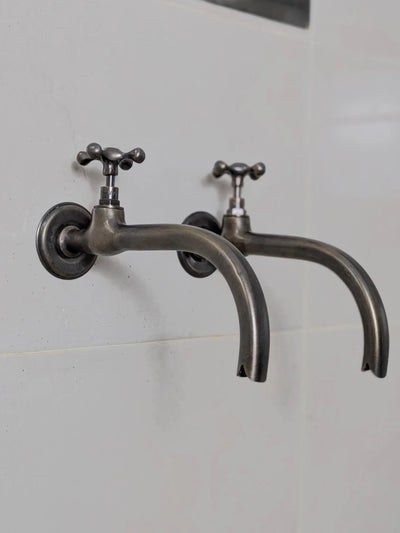 Vintage Brass and Blackened Wall-Mount Faucets