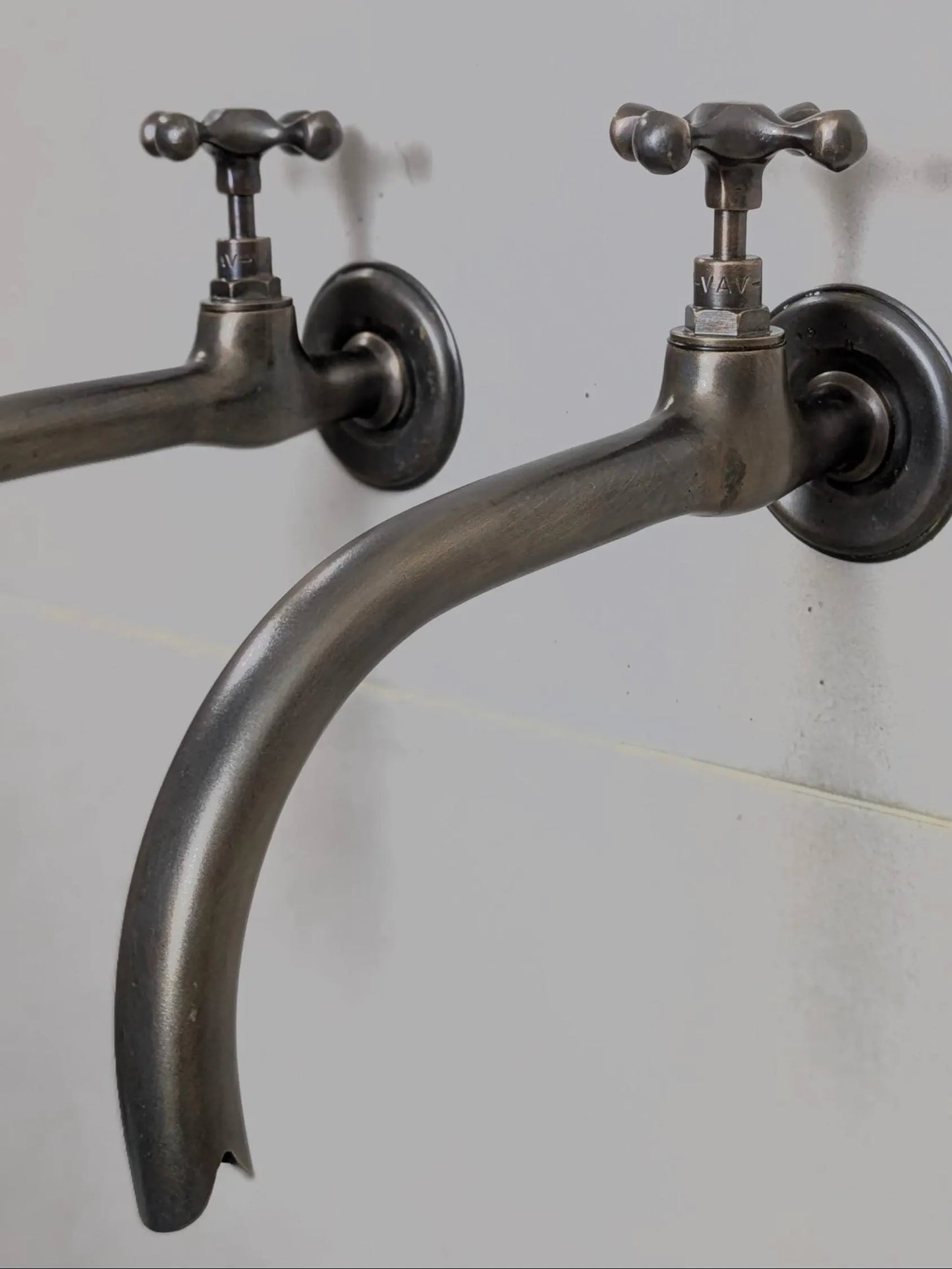 Vintage Brass and Blackened Wall-Mount Faucets
