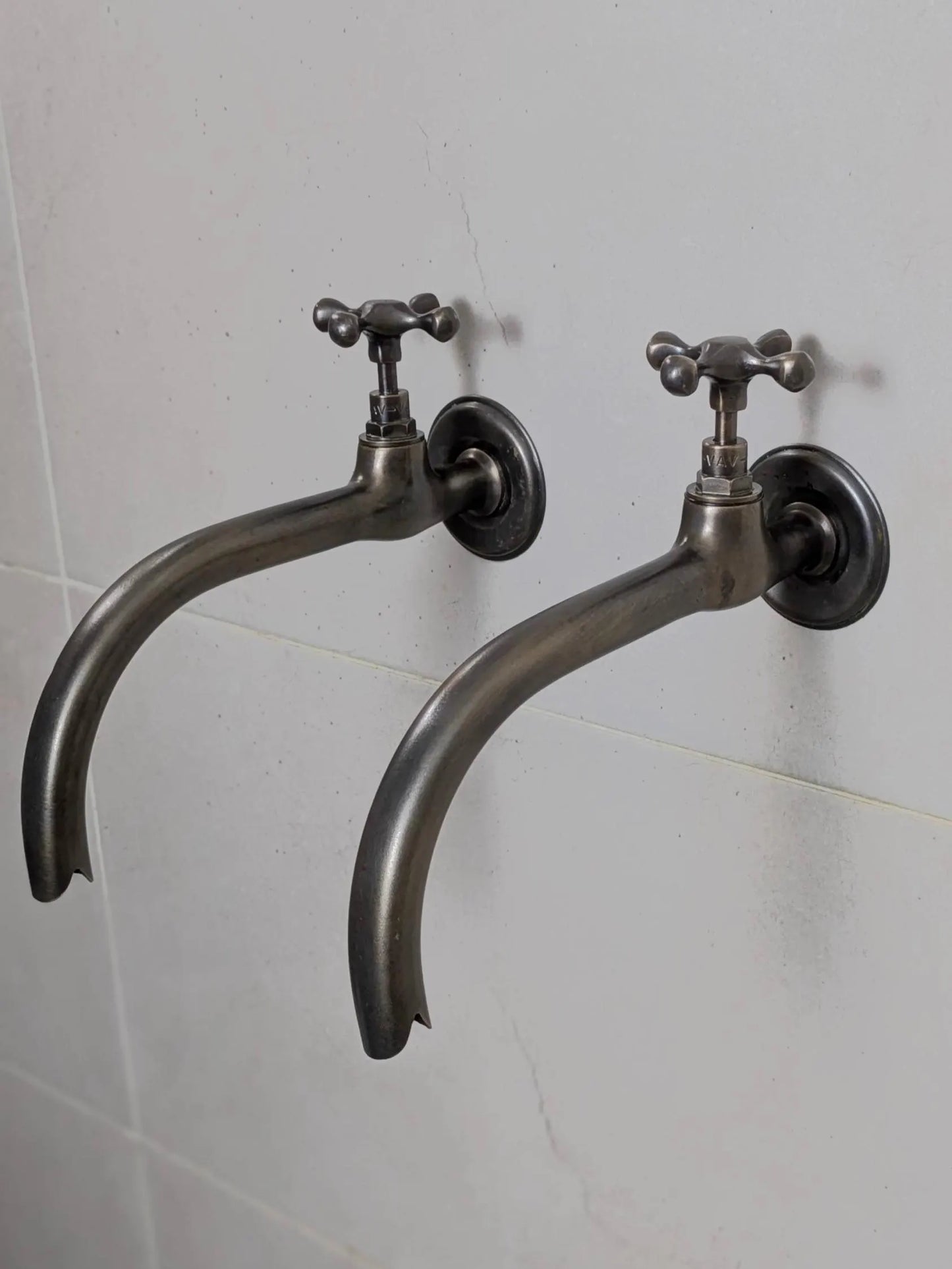 Vintage Brass and Blackened Wall-Mount Faucets