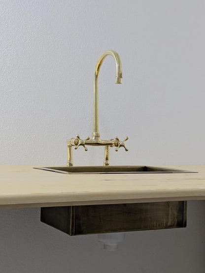 Handmade Unlacquered Brass Bridge Kitchen Faucet: Swivel Spout