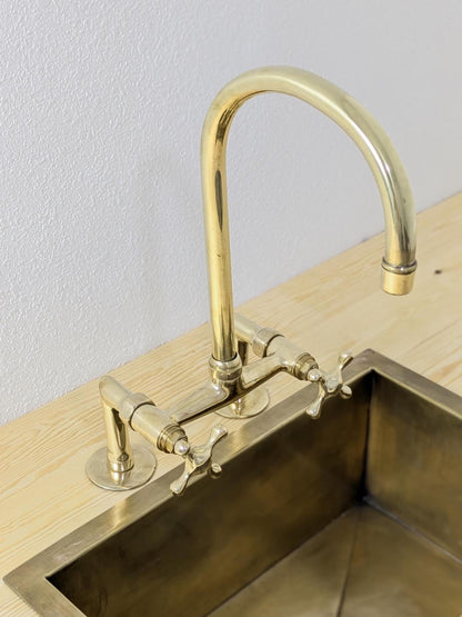 Handmade Unlacquered Brass Bridge Kitchen Faucet: Swivel Spout